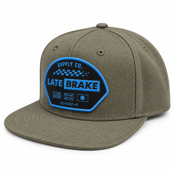 Late Brake olive green flat brim cap with a blue LATE BRAKE patch on a white background.